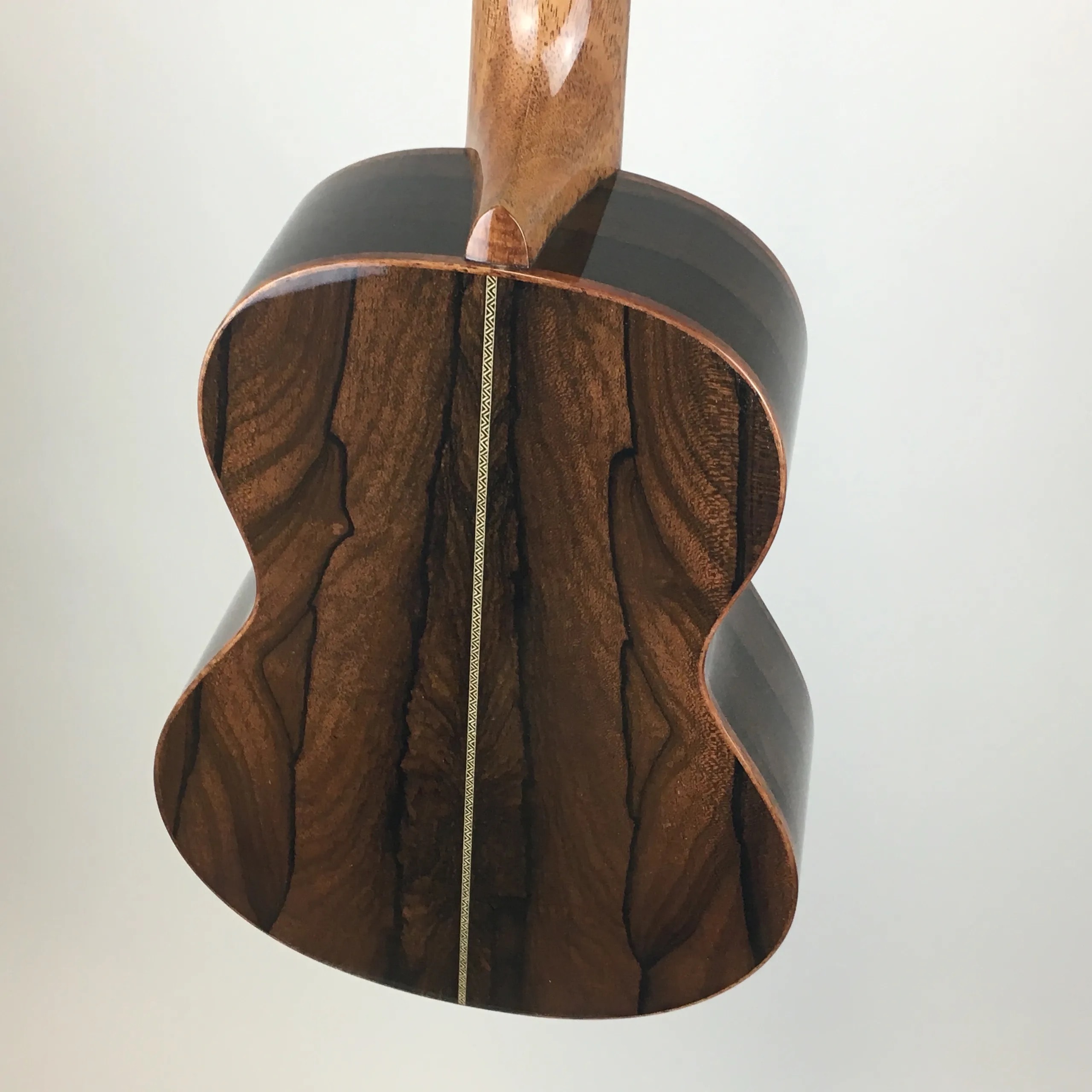 Finished Hapa ukulele back view showing wood grain